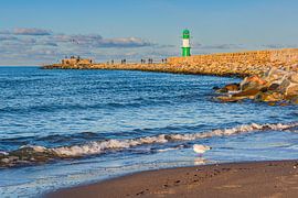 Pier and pier tower on the coast of the Baltic Sea in Warnemünde by Rico Ködder