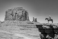 Cowboy on a horse in Monument Valley
