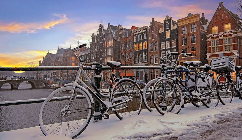 Snowy Amsterdam in the Netherlands at sunset by Eye on You