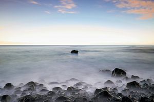 Lonely stone in the sea van Eric Hokke