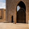 Two women go to pray at the Hassan II mosque in Casablanca by Rene Siebring