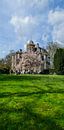 Staand panorama van het huis Jagtlust in 's-Graveland met bloeiende Magnolia van Martin Stevens thumbnail