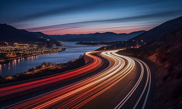 Time-lapse car light trails on the road by the sea at night by Animaflora PicsStock