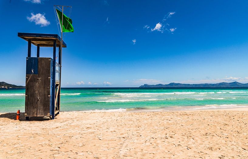 Beautiful sand beach with lifeguard tower for summer by Alex Winter