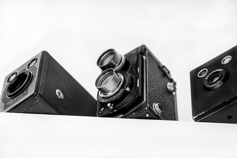 Old cameras in a row by foto by rob spruit
