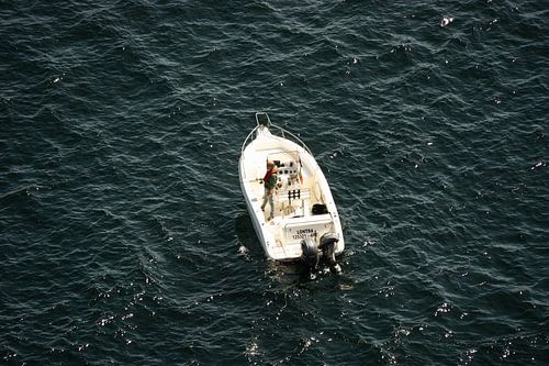 Fischer allein auf dem Meer