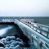 Frozen pier by Steven Groothuismink