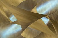 A beam of pale blue light caught in gold