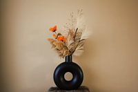 Modern serenity - flowers in black round vase