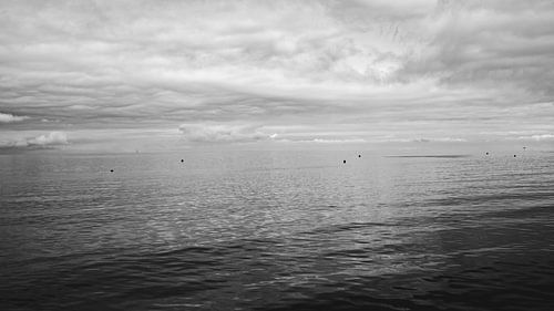 A tranquil lake beneath the clouds