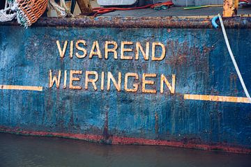 Fishing boats moored in Den Oever harbour by scheepskijkerhavenfotografie