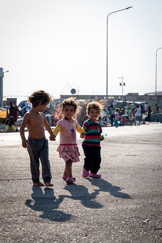 Three young girls walking hand in hand in Greece | Photography art print portrait