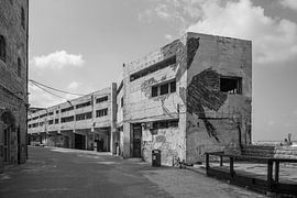 Concrete buildings at the harbor of the old town of Jaffa, Tel Aviv. Israel by Joost Adriaanse