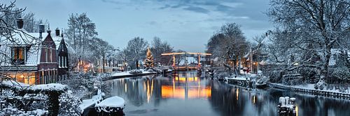 Illuminated Christmas tree and drawbridge in Vreeland on the Vecht River, Netherlands.