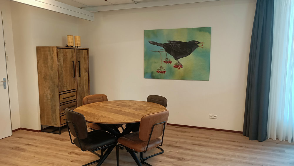 Amsel auf Gelderlander-Rose, von Jasper de Ruiter