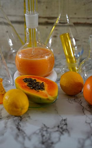 Papaya cocktail met rum, citroen en sinaasappel