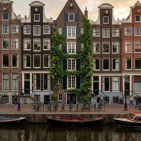 Historic canal-side houses along an Amsterdam canal by But First Framing