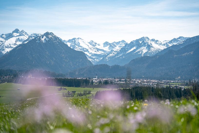 Spring with snow in the Allgäu mountains and a view of Oberstdorf by Leo Schindzielorz