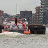De grote, stoere duwboot van scheepskijkerhavenfotografie