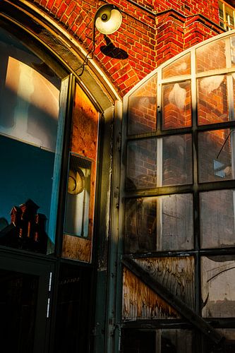 Brick Arch Glow – Industrial Window & Gooseneck Lamp at Golden Hour