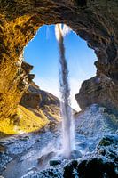 Behind the waterfall Kvernufoss