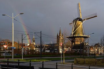 Arc-en-ciel sur la ville historique de Delft sur PixelPower