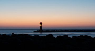 Red beacon in twilight by Patrick Schwarzbach