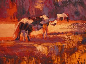 Cows along the forest edge in tangerine orange