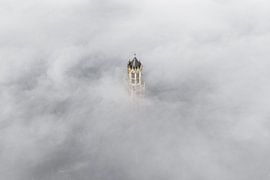 Dom tower in the morning mist in Utrecht by Bas van Setten