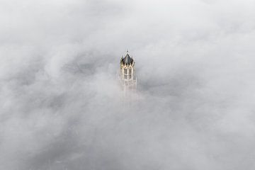 Dom tower in the morning mist in Utrecht by Bas van Setten