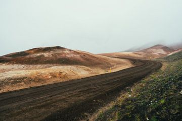 Lonely gravel road in Iceland by Shanti Hesse