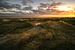 Zonsondergang boven de duinen van Oliver Henze