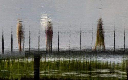 three humans on a bridge