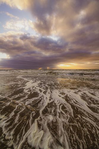 Strand, zee en wolken