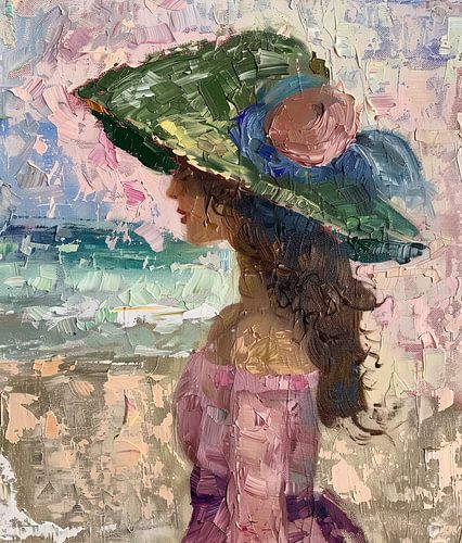 vrouw met hoed aan het strand