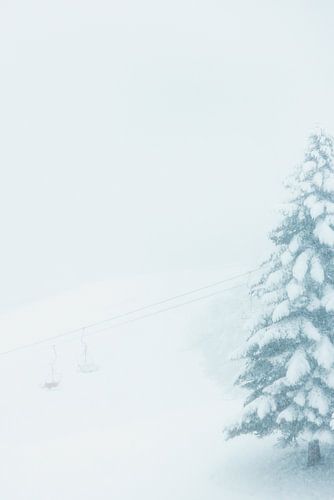 Ski lift during a snowstorm