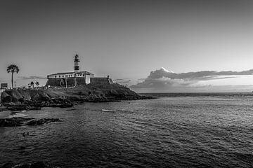 Black and White image of Barra Lighthouse during the beginning of the twilight in the city of Salvad by Castro Sanderson