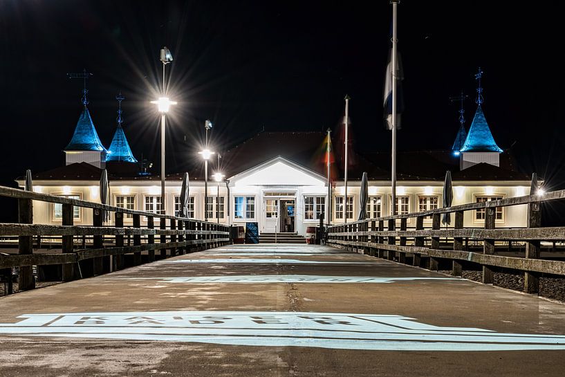 A view of the pier in Ahlbeck on the Baltic Sea at night by Andreas Völkel