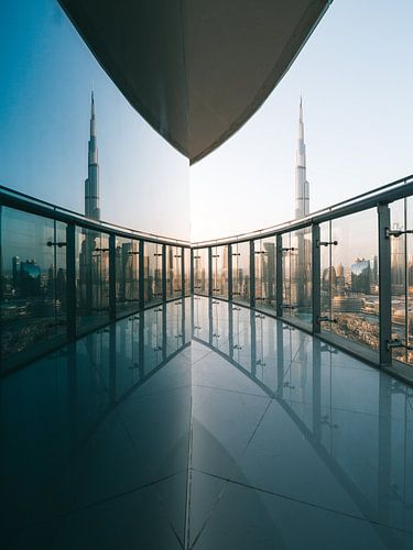 Burj Khalifa and reflection in the glass (glass window) from balcony in Downtown Dubai