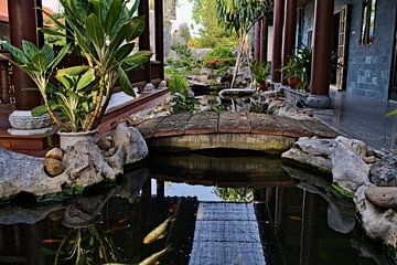 Peaceful water garden and Asian architecture by Frank Photos