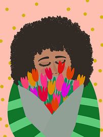 Vrouw ruikt aan verse bos tulpen van Sam Soesbergen