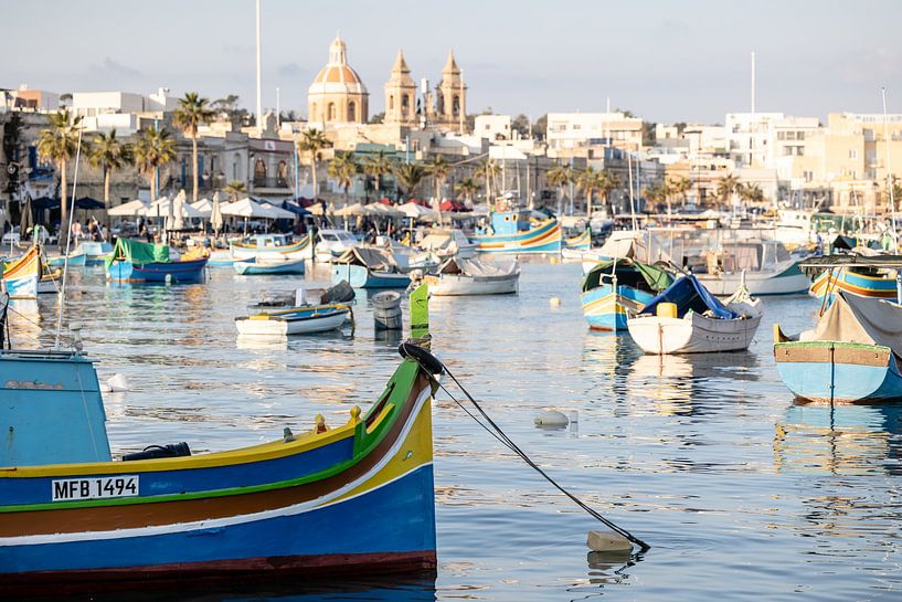 View of Marsaxlokk harbour with fishing boats by Eric van Nieuwland