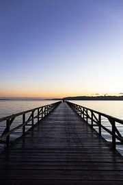 View of the water at sunrise from a pier in Flensburg, Germany | Travel Photography by Kelsey van den Bosch