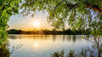 Meer bij zonsondergang van Günter Albers