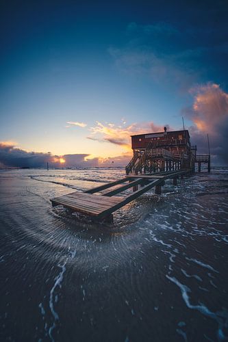 Stilt house in the evening light - St. Peter-Ording