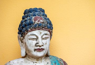 buddha statue in a temple by Animaflora PicsStock