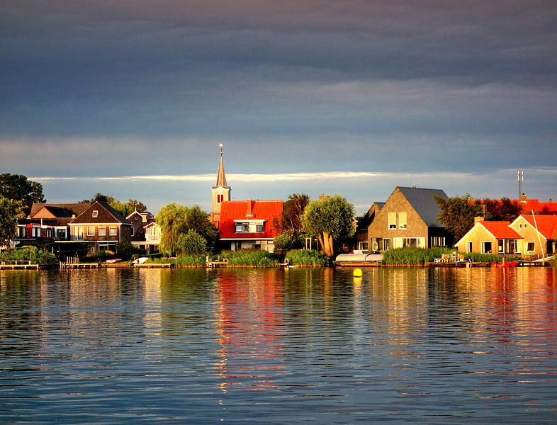 Dutch  village Oudega with reflection by Pieter Heymeijer