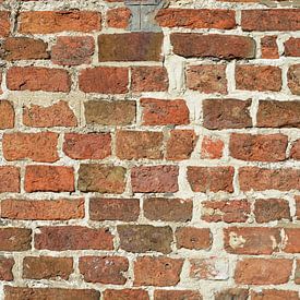 Detail van een oude bruin oranje muur van Trinet Uzun