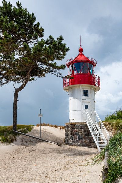 Hiddensee lighthouse in dune landscape by Alexander Baumann