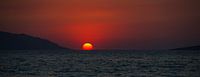 Zonsondergang in de zee